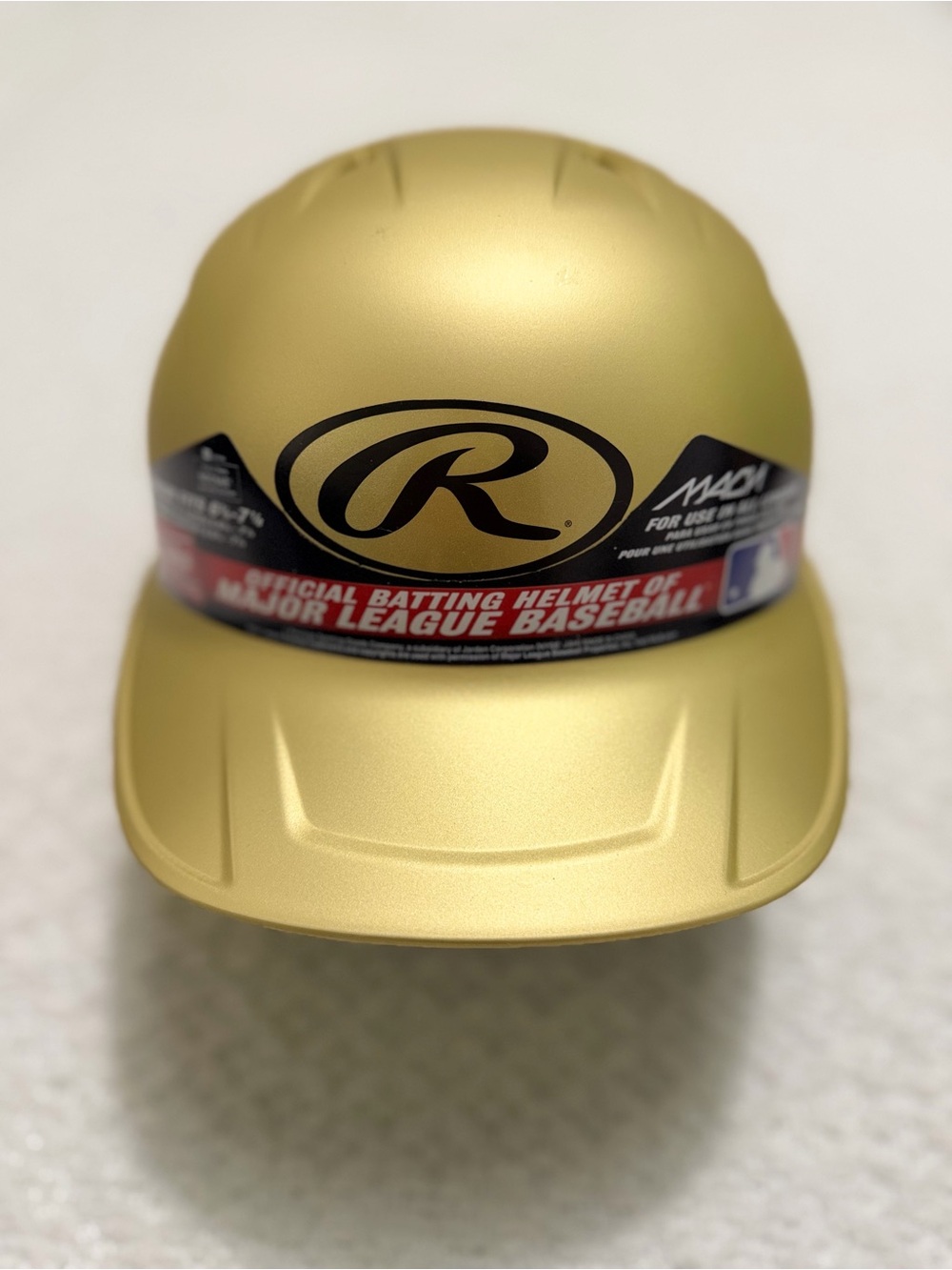 Rawlings MACH Junior Batting Helmet in Matte Vegas Gold Size Junior 6 3/8- 7 1/8